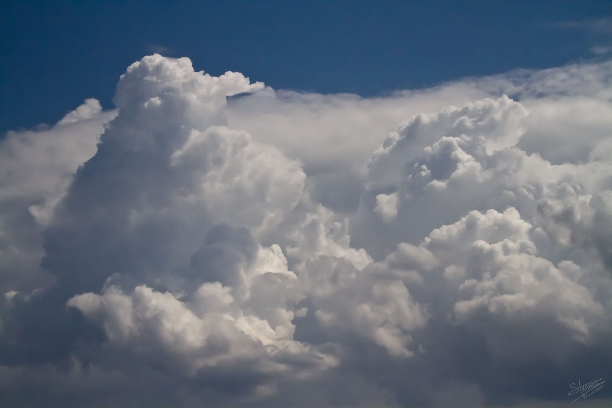 Big, fluffy cumulus clouds on a lazy Monday.