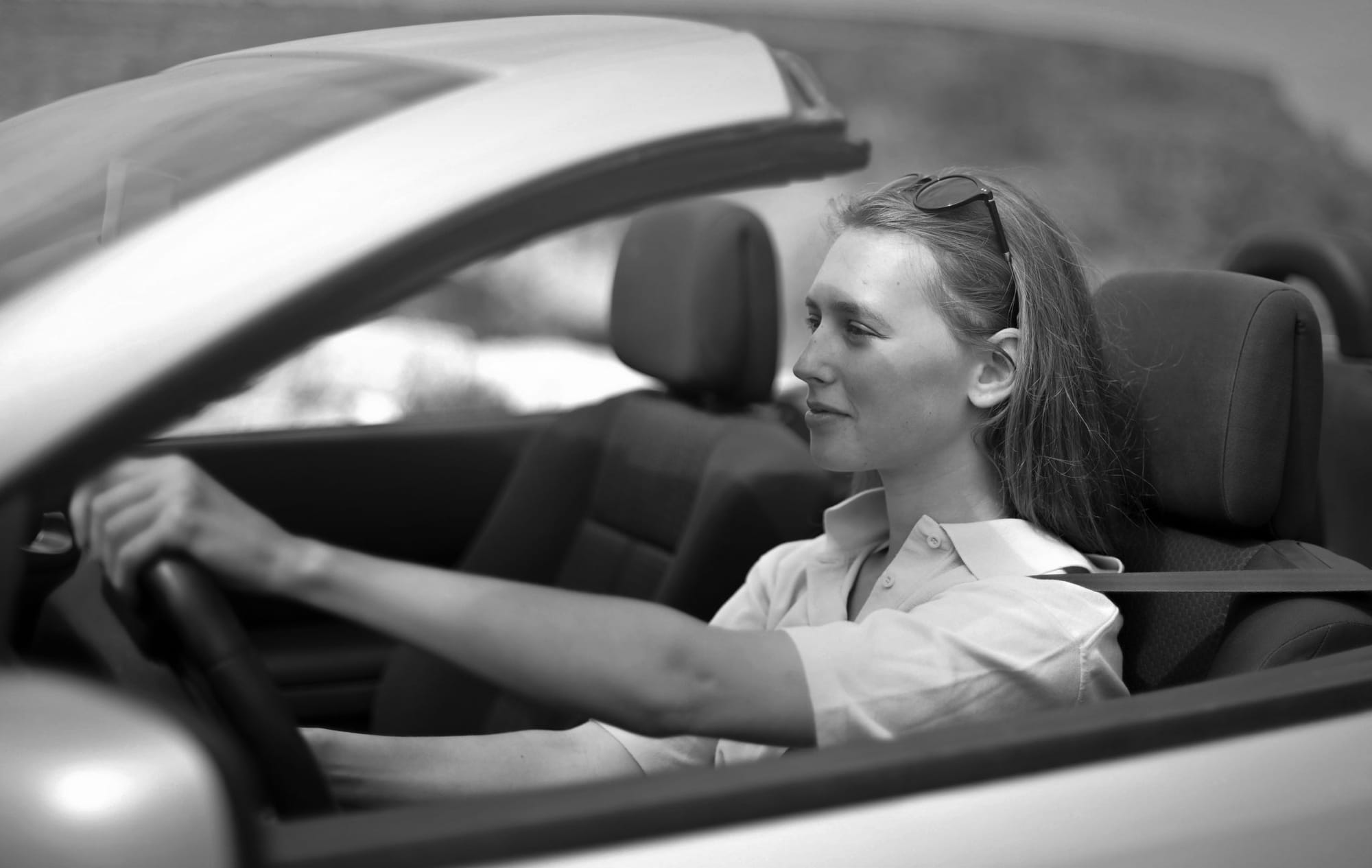Woman driving in silence.
