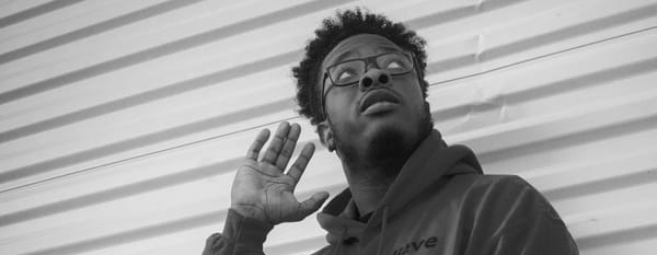 Man listening to someone speak.